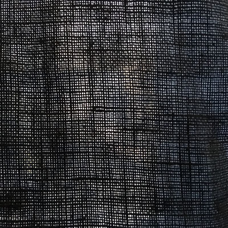 light shining through dark garment